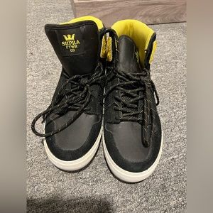 New and barely worn black and yellow Supra high top sneakers